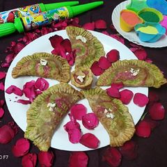 A picture of Colourful chocolate coconut gujiya.