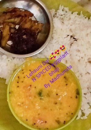 A picture of Lehsuni Dal and spicy eggplant.