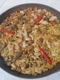 Paella con carne di roberta