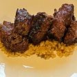 Bourbon Marinated Tenderloin over Brown Rice