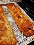 Sausage Pepper & Broccoli Rabe Calzone with Roasted Peppers & Mozzarella