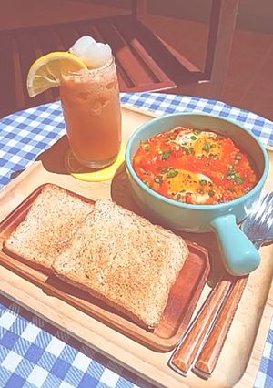 Hình của món Egg shakshuka - trà chanh vải.