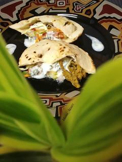A picture of Pita bread with mince filling.