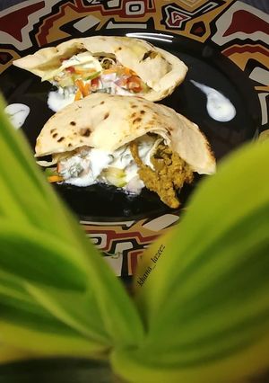 A picture of Pita bread with mince filling.