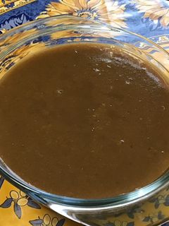 Une photo de Compote de prunes au curaçao et sucre punjabi