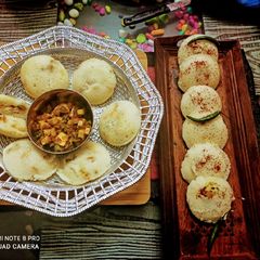 A picture of Batata vada and paneer chilli stuffed idli.