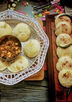 A picture of Batata vada and paneer chilli stuffed idli.