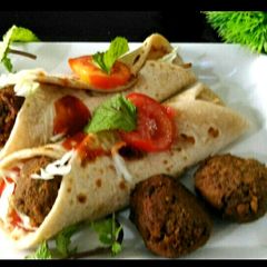 Pita bread wrap with mutton kebab A picture of Pita bread wrap with mutton kebab.