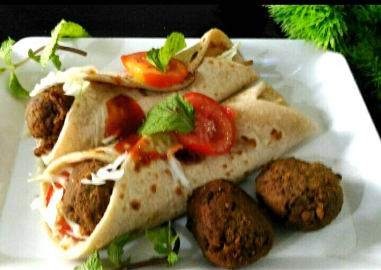 Pita bread wrap with mutton kebab