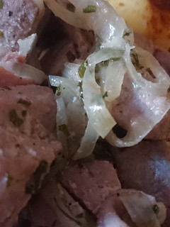 Una foto de Ventresca de atún encebollada