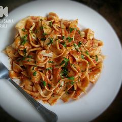 A picture of Papardelle pasta purely homemade.