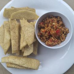 A picture of Fried yam with scrambled egg.