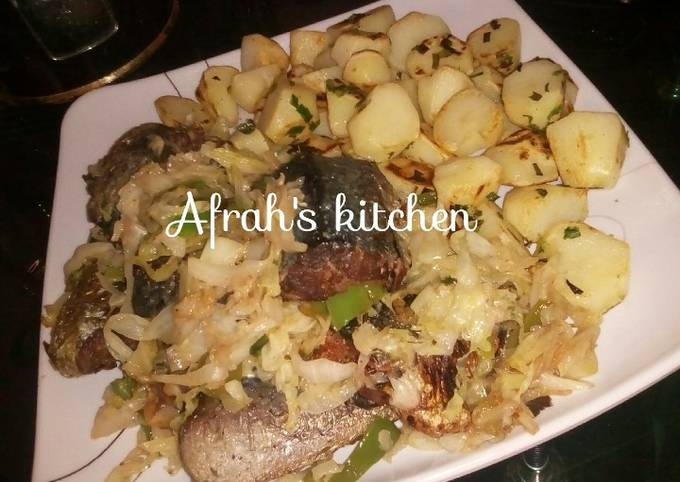 How to Prepare Homemade Baked potatoes and oven fish with cabbage sauce