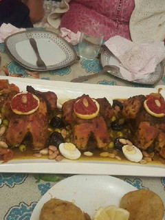 Una foto de Pollo en salsa de cebollas