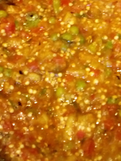 A picture of Roasted Aubergine with peas.