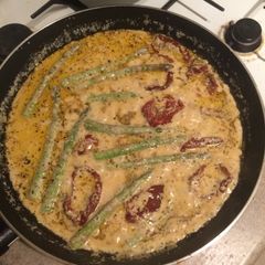A picture of Creamy Sun-dried Tomato with Asparagus and Fish.