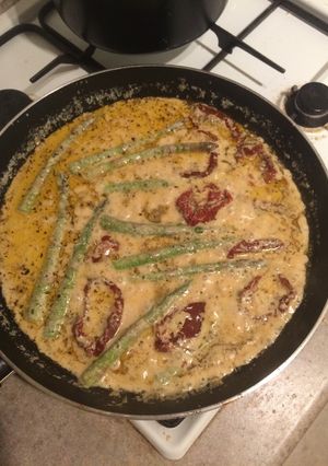 A picture of Creamy Sun-dried Tomato with Asparagus and Fish.