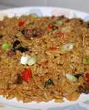 Arroz navideño con cerdo y frutos secos