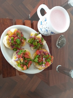 A picture of Mini bread pizzas#Kids Recipe contest.