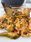 Arroz mar y montaña con lomo y bacalao