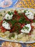 Salade Castelfranco aux tomates, carottes violettes, burrata et persil