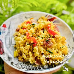 A picture of Millet porridge with bacon and vegetables in a multicooker.