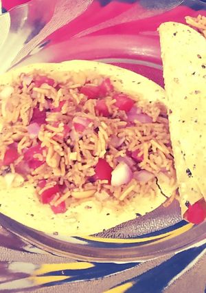 A picture of Bhel on masala papad.