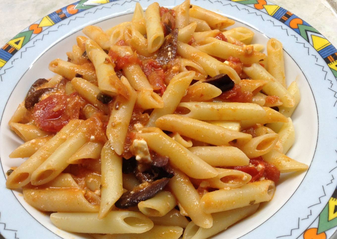 Pasta with cherry tomatoes, olives and feta cheese!