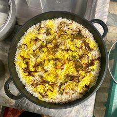 A picture of Hyderabadi Chicken Biryani.