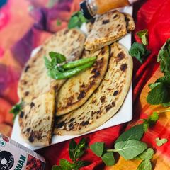 A picture of Schezwan Chicken Paratha.