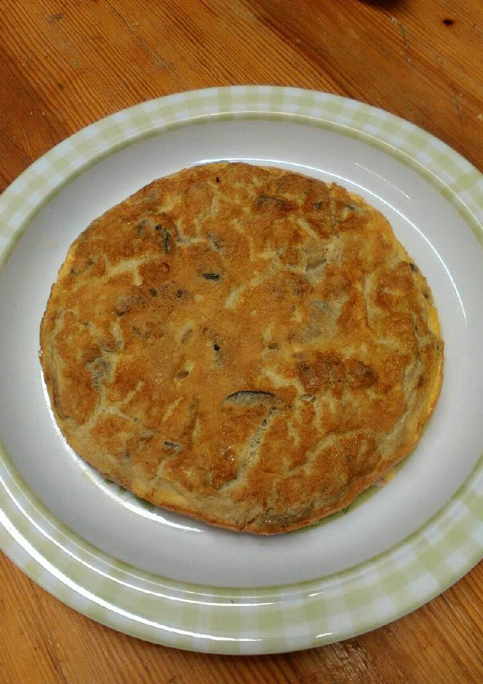 Una foto de Tortilla de berenjena y setas