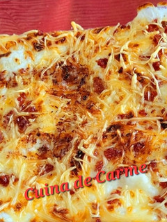 Una foto de Huevos gratinados con virutas de jamón
