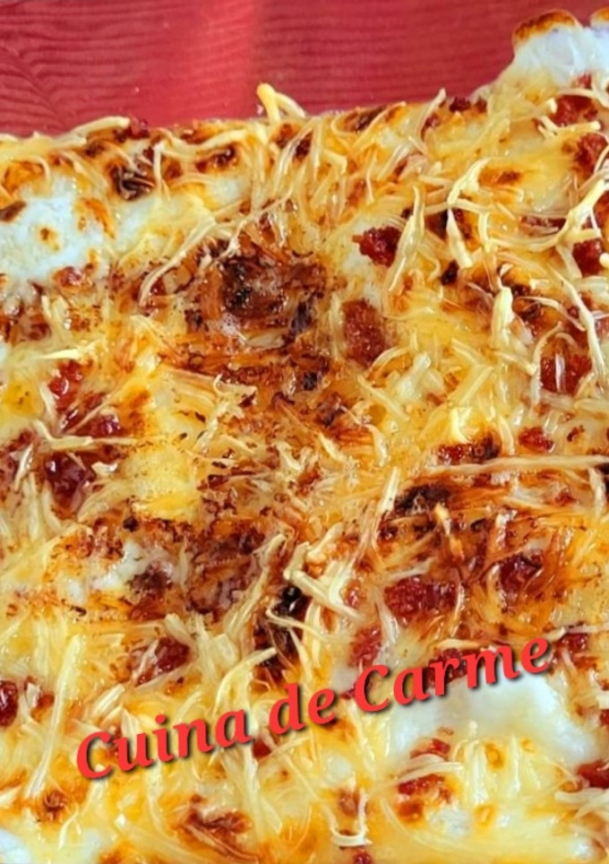 Una foto de Huevos gratinados con virutas de jamón
