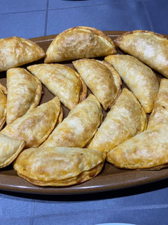 Una foto de Empanadillas de atún con pisto al horno