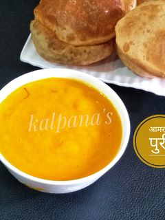 आमरस पुरी (aamras puri recipe in marathi) रेसिपी चे मुख्य फोटो 