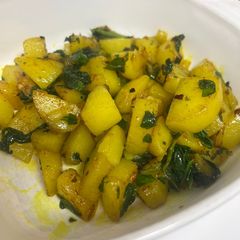 A picture of Braised Potatoes with Spinach.