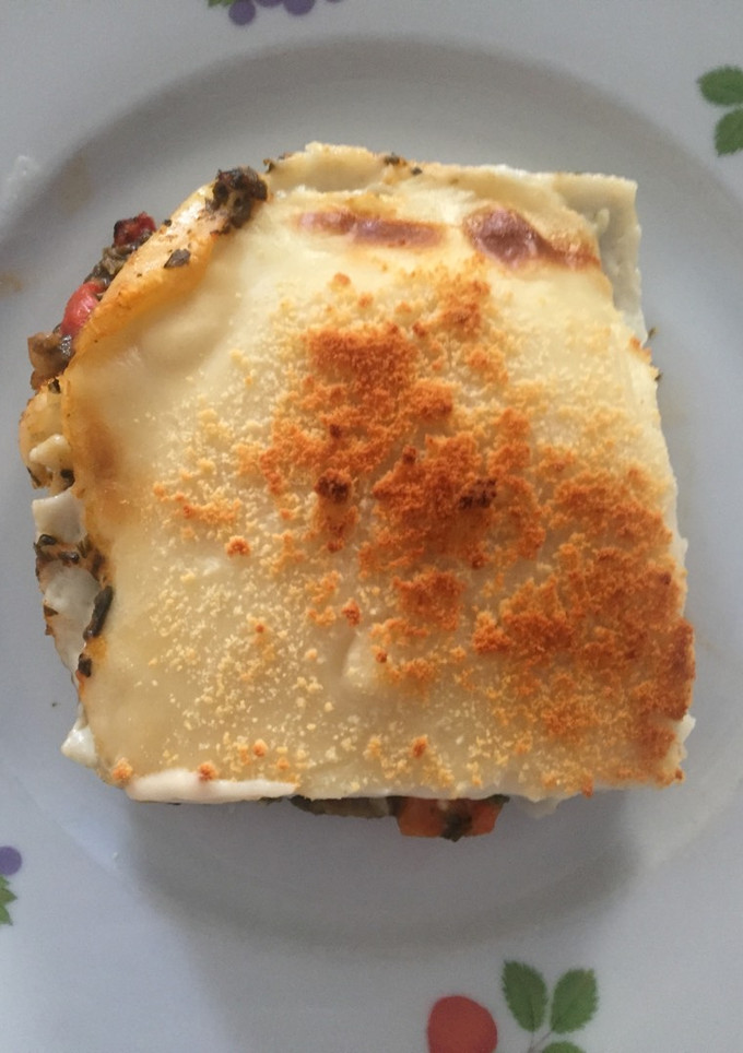 Una foto de Lasaña de espinacas y bacon 🍝