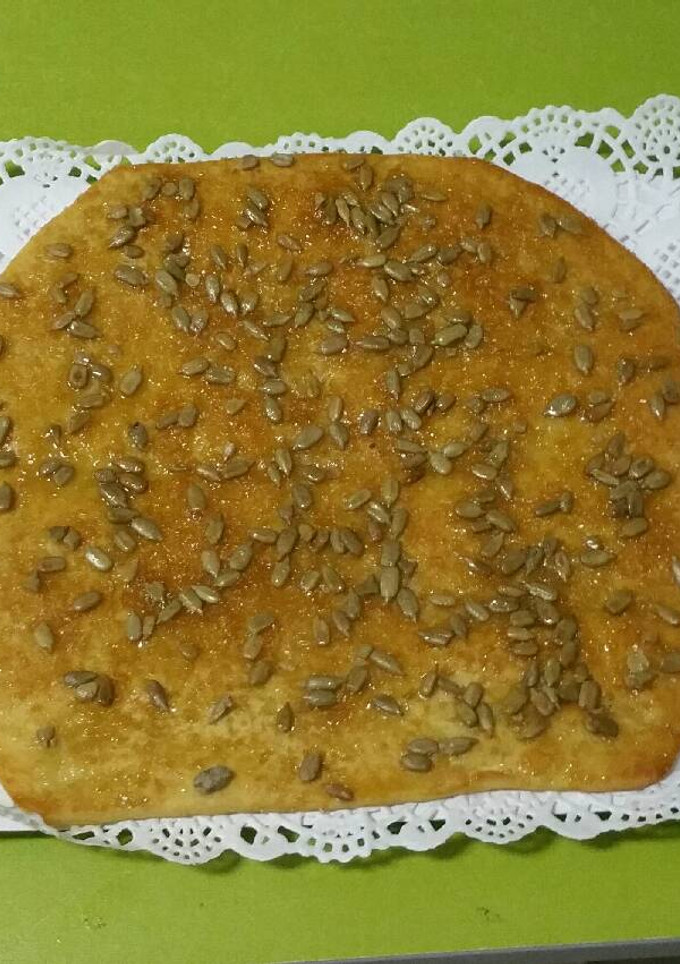 Una foto de Coca de pipas con base de pizza