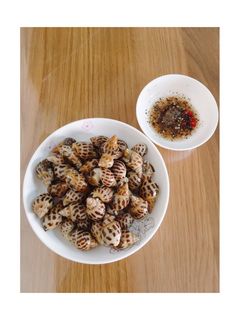 Hình của món Ốc hương xào bơ tỏi.