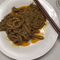 A picture of Curry malana (chicken intestines).