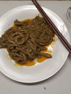 A picture of Curry malana (chicken intestines).