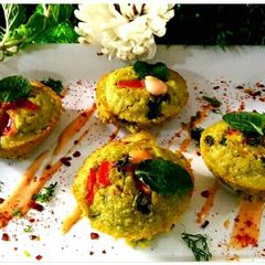 A picture of Sprout moong and peas savoury muffins.