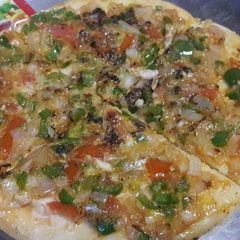 A picture of Homemad pizza.