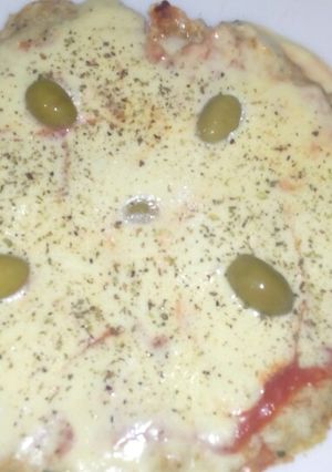 Una foto de Pizza con masa de merluza