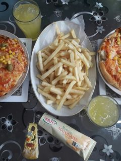 صورة لوصفة بيتزا بالذرة