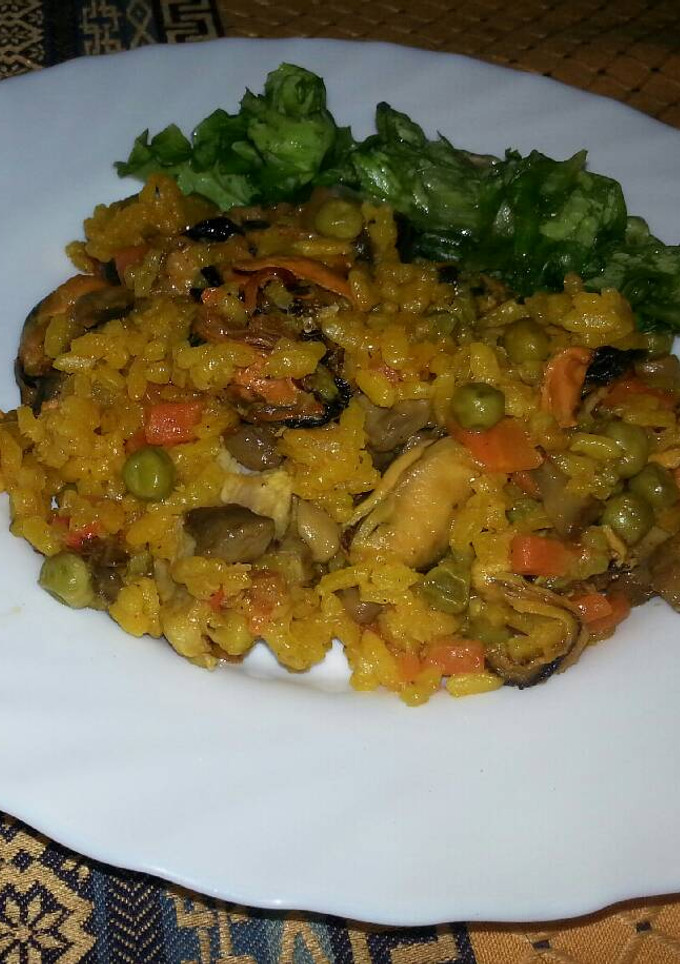 Una foto de Arroz con mejillones y verduras