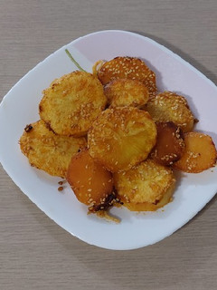 عکسی از دستور ته دیگ سیب زمینی کنجدی
