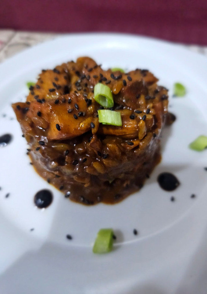 Una foto de Arroz, pollo y rovellones