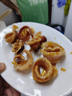 Una foto de Torreznos en salsa de miel