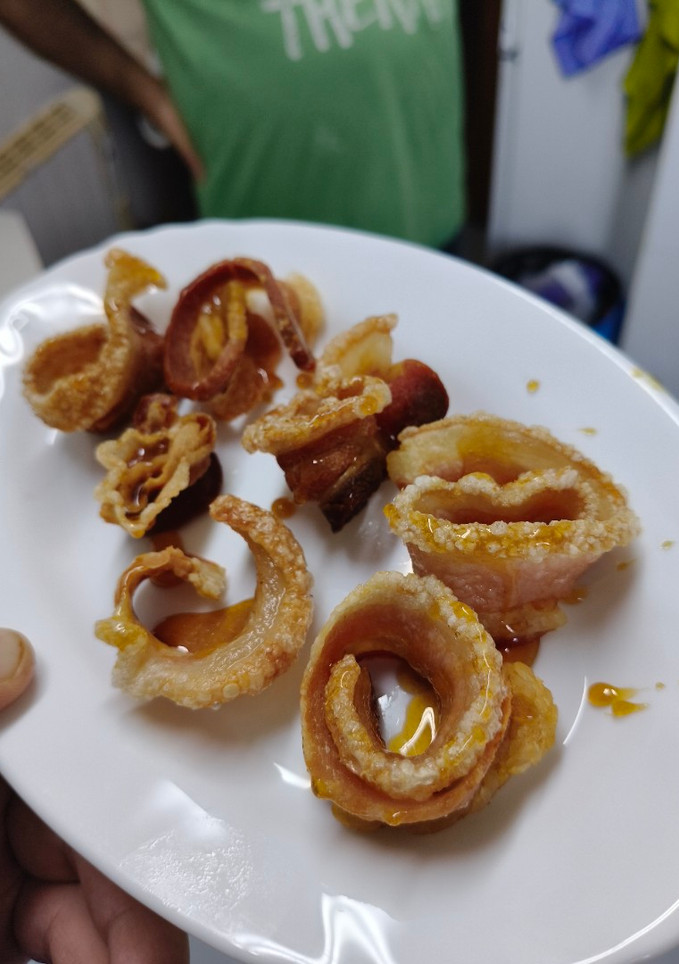 Una foto de Torreznos en salsa de miel